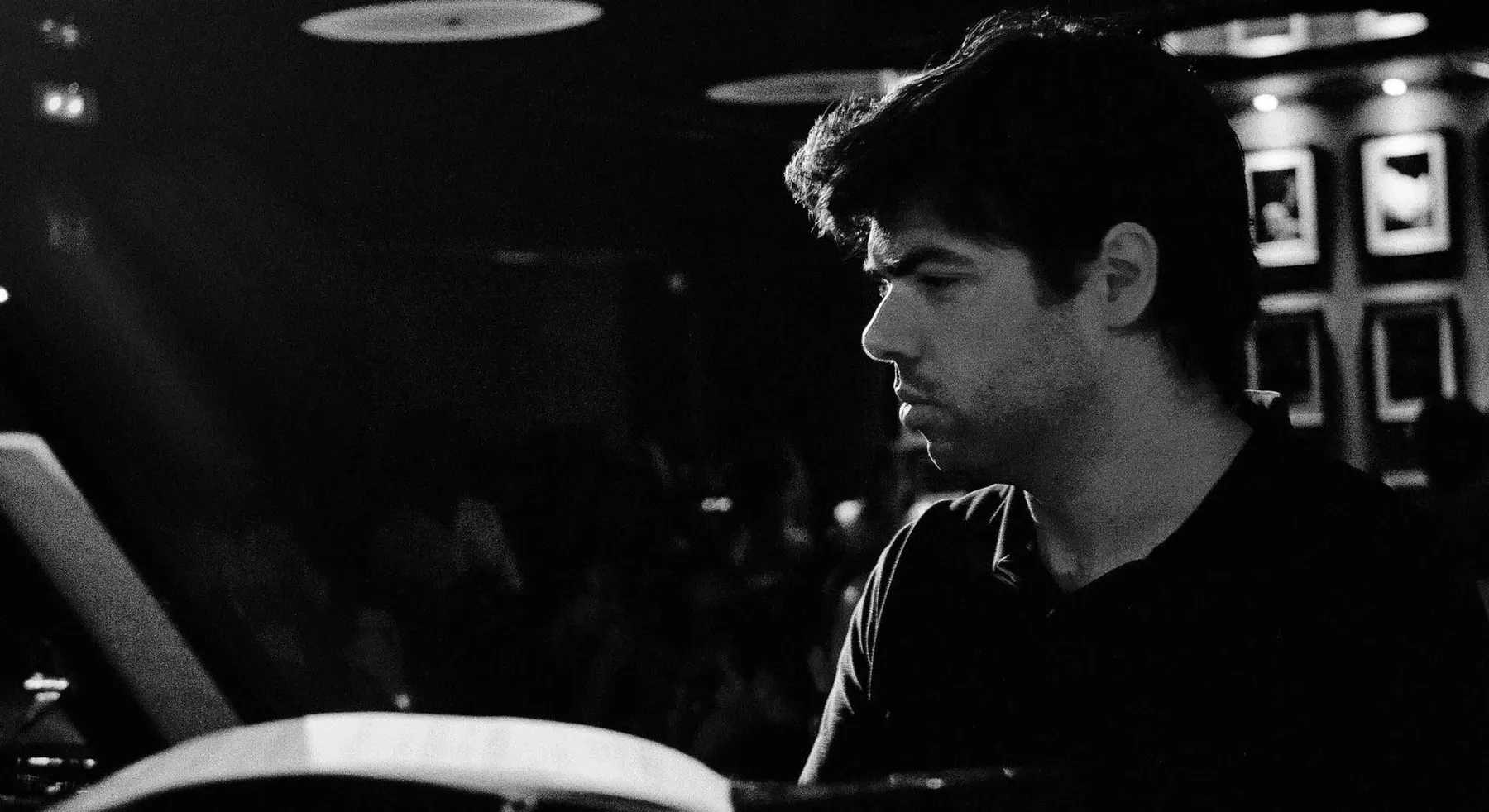 Pedro playing piano at SCAT Jazz Club with his jazz quartet